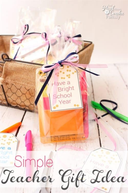 A simple gift bag with school supplies and a handwritten tag.