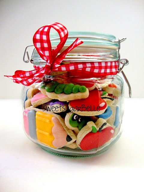 Decorated cookies in a jar with a thank you tag