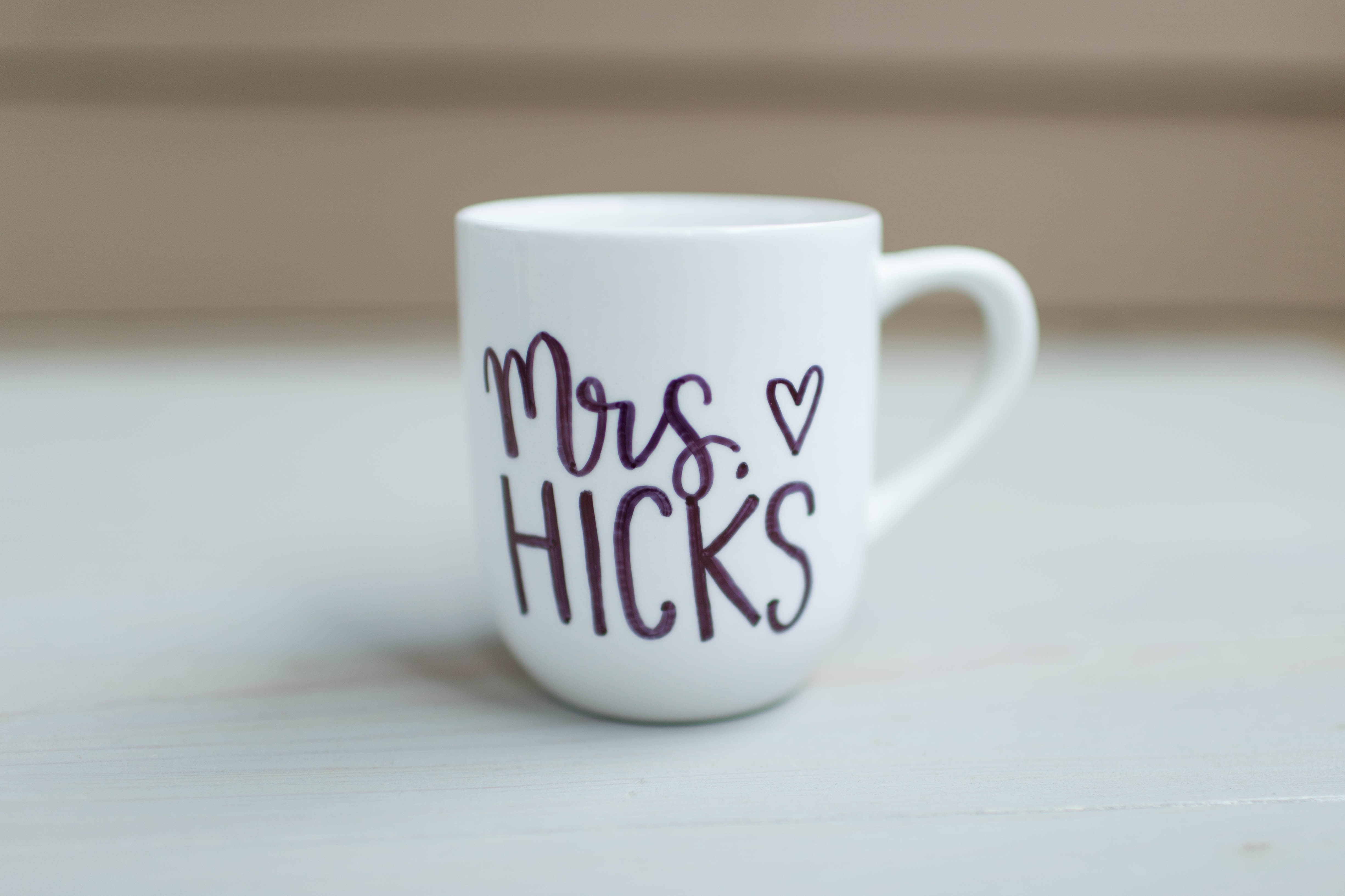 Personalized coffee mug with teacher's name