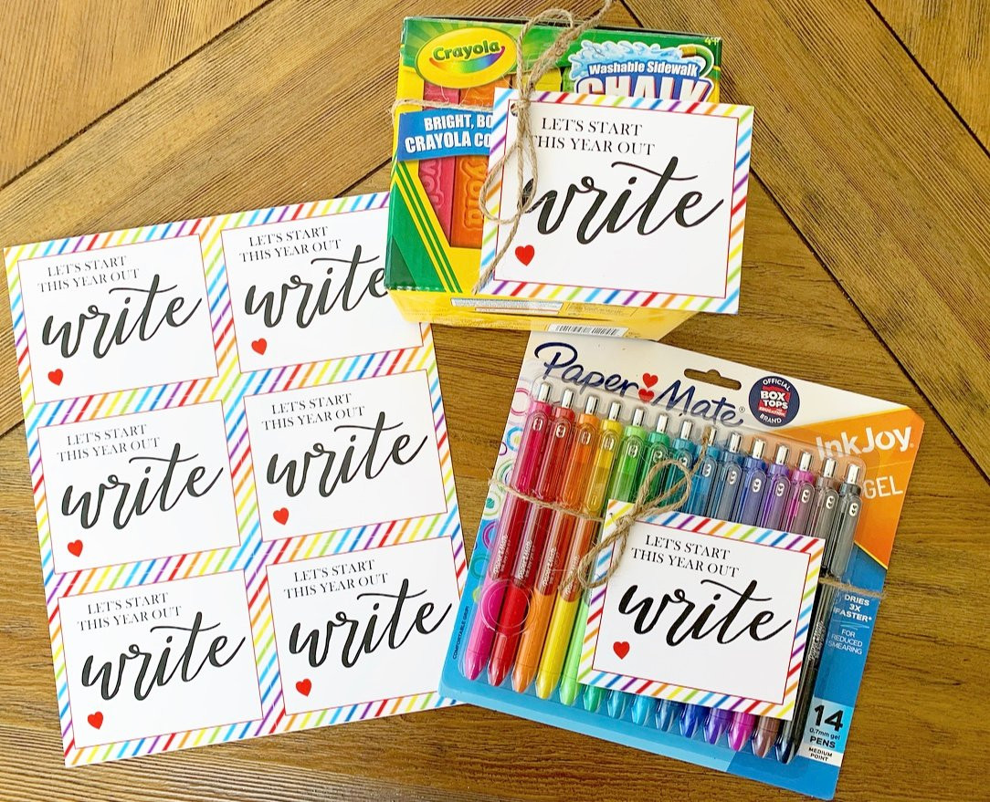 Personalized stationery set with engraved pen and notepad.